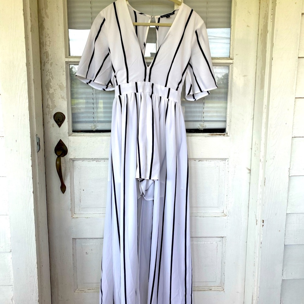 Medium, romper with trail behind it